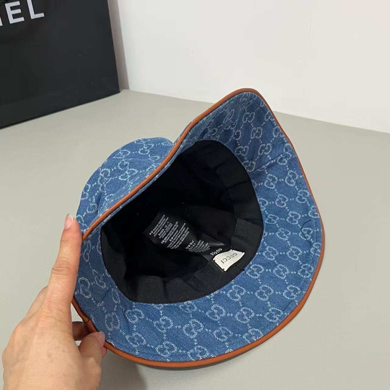 Blue Gucci interlocking GG monogram gold-toned horsebit bucket hat - Image 3