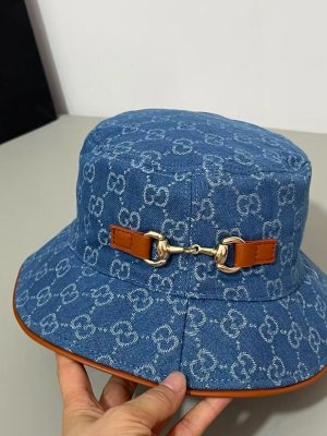 Blue Gucci interlocking GG monogram gold-toned horsebit bucket hat