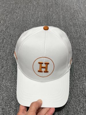 White Hermes embroidered circular “H” logo baseball cap