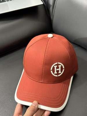 Orange Hermes embroidered circular “H” logo white trim baseball hat