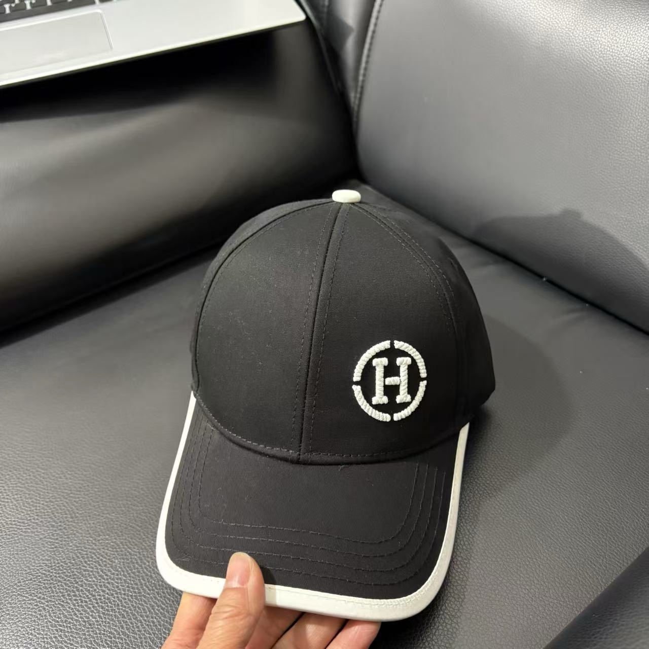 Black Hermes embroidered circular "H" logo white trim baseball hat