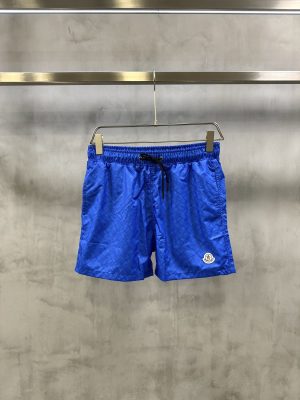 Blue Moncler all-over ‘M’ pattern monogram-jacquard swim shorts