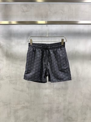 Black on black Off-White all-over stenciled monogram logo swim shorts