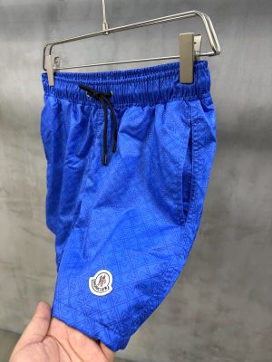Blue Moncler all-over ‘M’ pattern monogram-jacquard swim shorts
