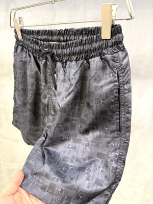 Black Hermès “Metal au Carre” swim trunks