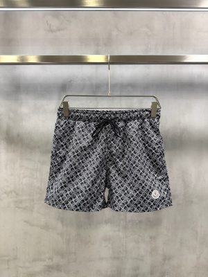Black Moncler all-over ‘M’ pattern monogram-jacquard swim shorts