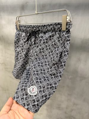 Black Moncler all-over ‘M’ pattern monogram-jacquard swim shorts