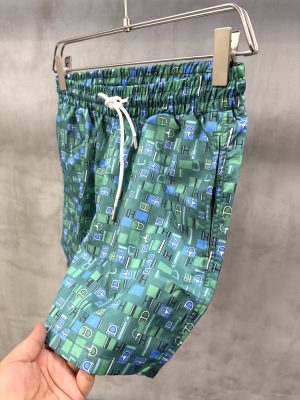 Green Hermès “Metal au Carre” swim trunks